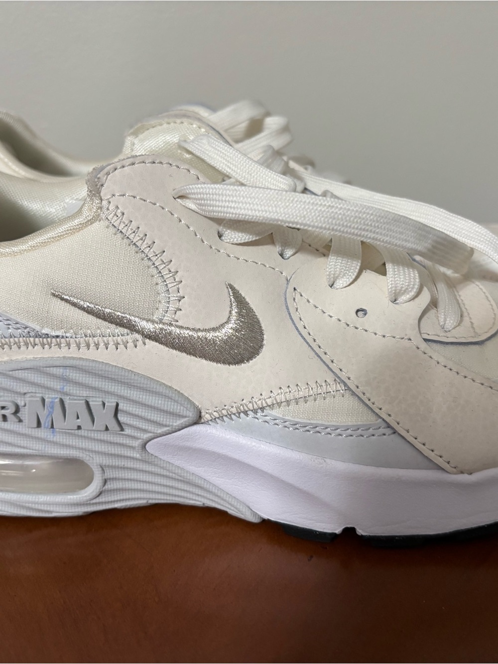 Nike Womens White Sneakers with Silver Swoosh
